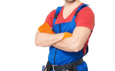 A smiling HVAC worker wearing a hard hat, orange gloves, a red shirt, and blue overalls stands with arms crossed. He has a tool belt with various tools around his waist.